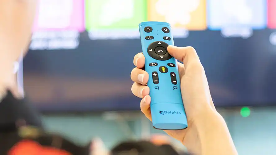 Holding the GuideConnect Remote Control